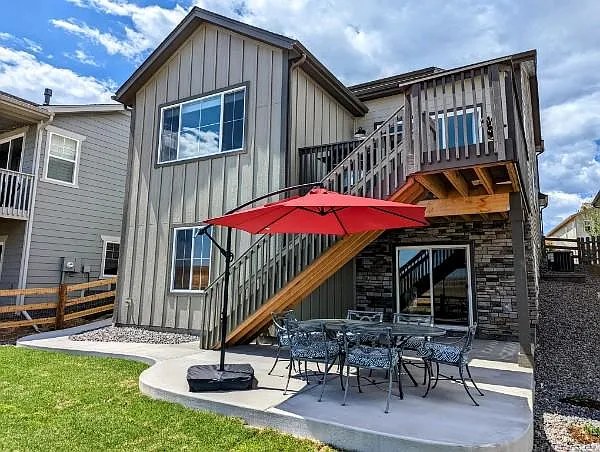Back exterior: the home backs to protected open space